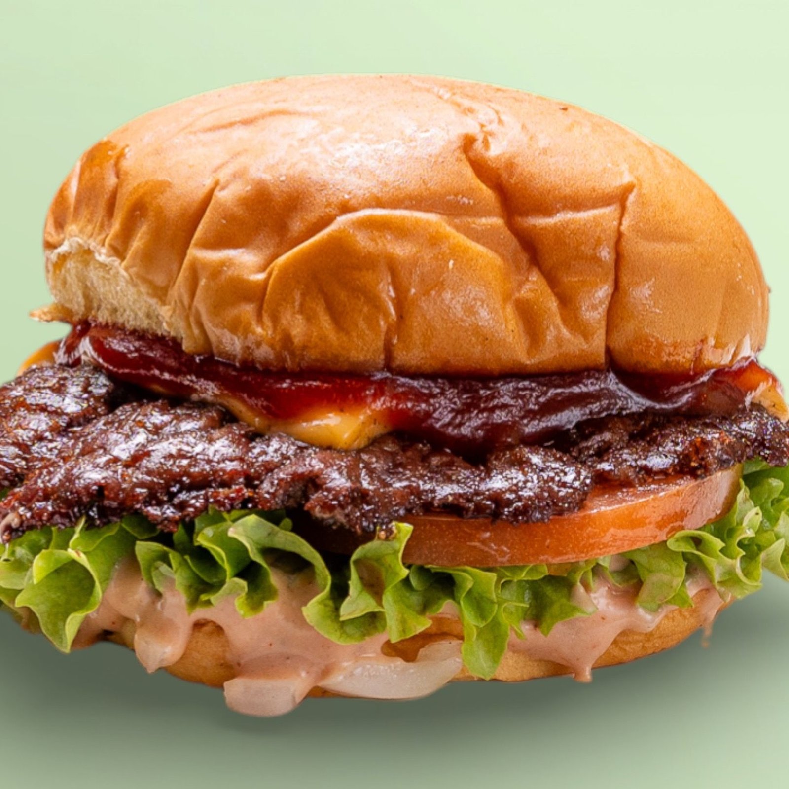 Cheesy Burger von Burger Hannes mit krossem Smash-Patty und geschmolzenem Käse